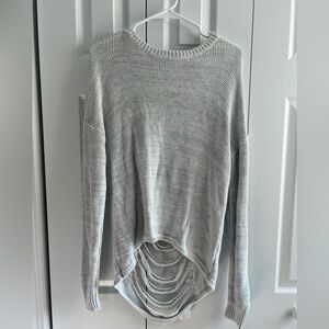 stitches and stripes grey sweater with cutouts in the back